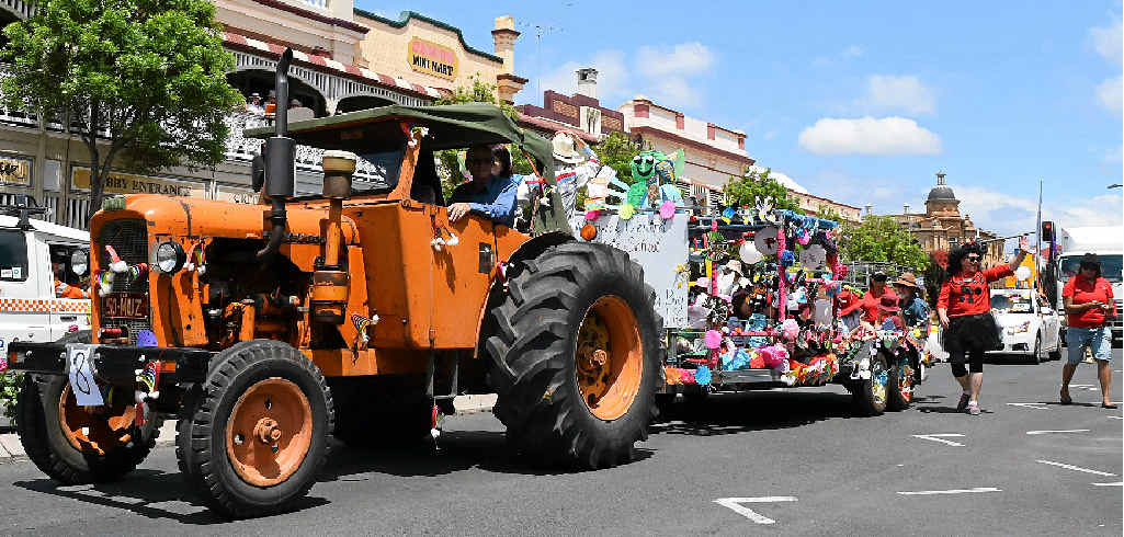 PARADE WINNERS: Warwick Central State School students wave from their Bug Life float as winners of the best float in the Parade. PARADE WINNERS: Warwick Central State School students wave from their Bug Life float as winners of the best float in the Parade.